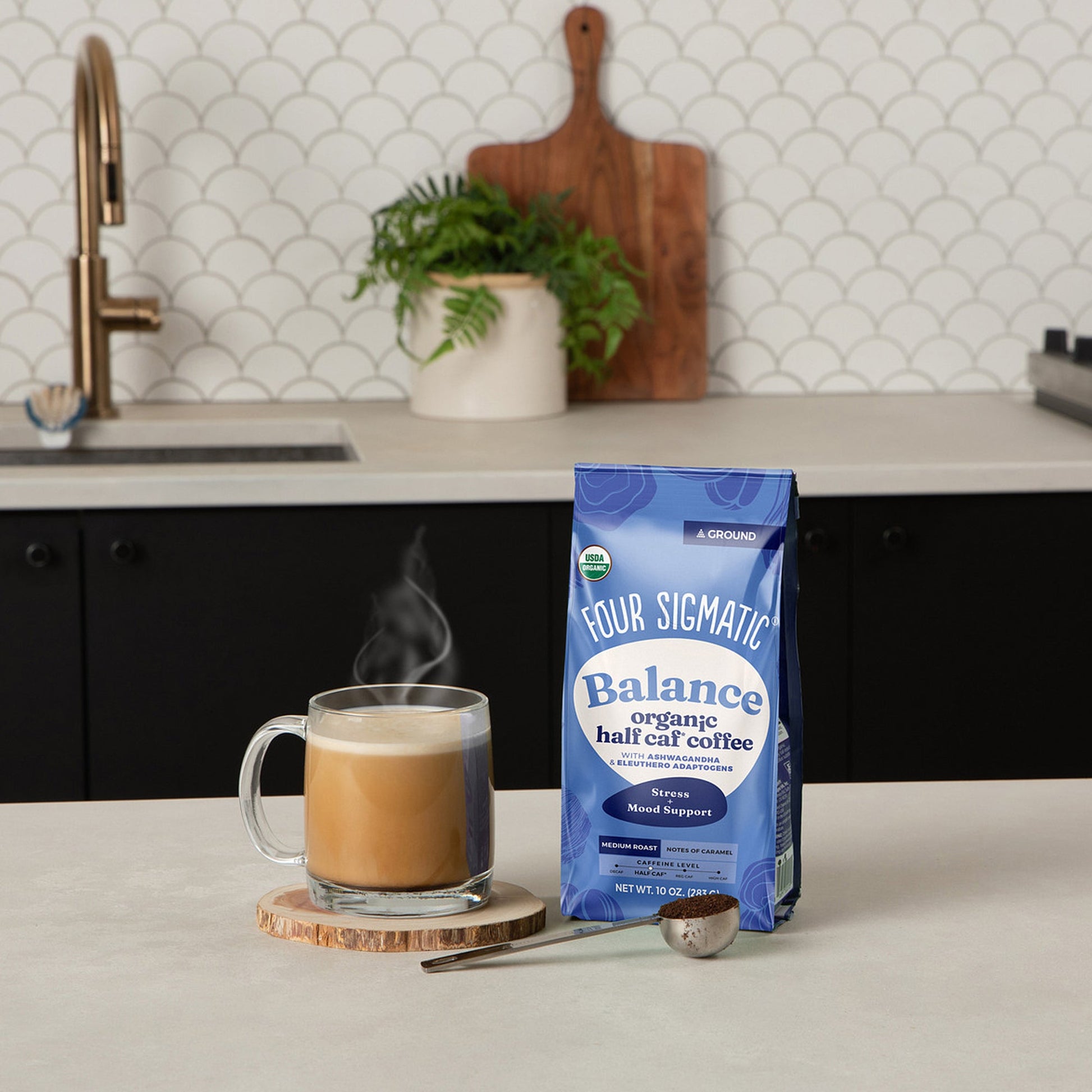 balance-half-caf-ground-coffee-medium-a4 Balance_Half_Caf_10oz_Lifestyle_1.jpg