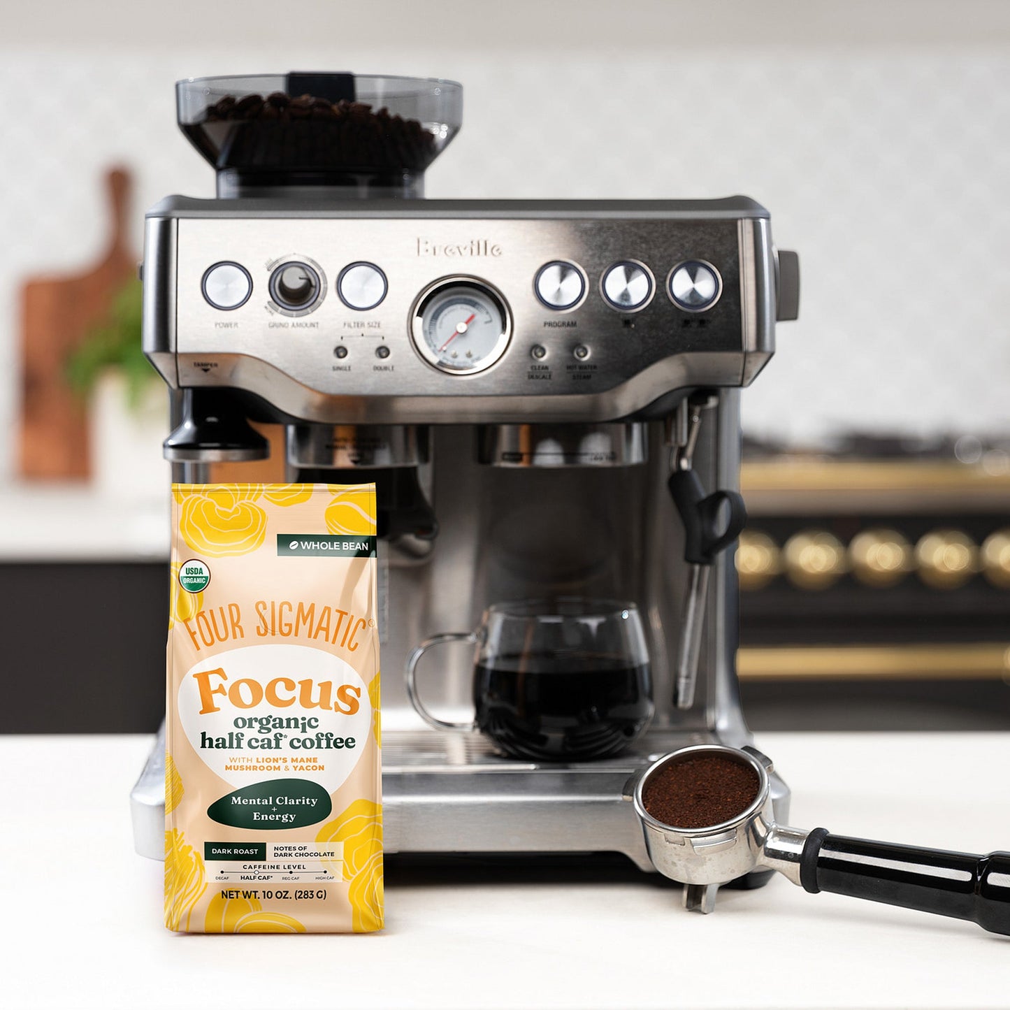 focus-half-caf-whole-bean-coffee-o7 Focus_Org_Dark_Roast_High_Caf_Kitchen_Pour_Woman_4_47b71a0c-c7fc-40fd-a2bc-fa7389dfb410.jpg